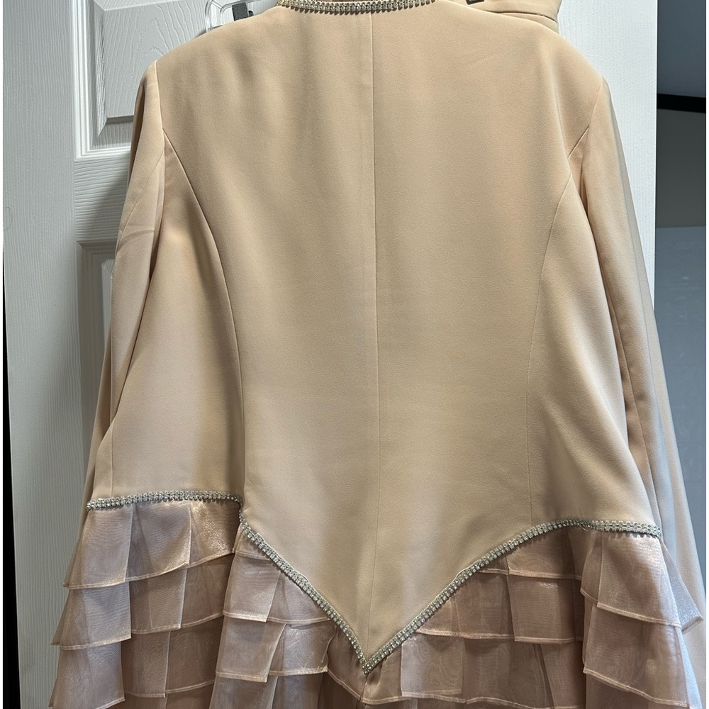 This is the back of the jacket of the three-piece suit